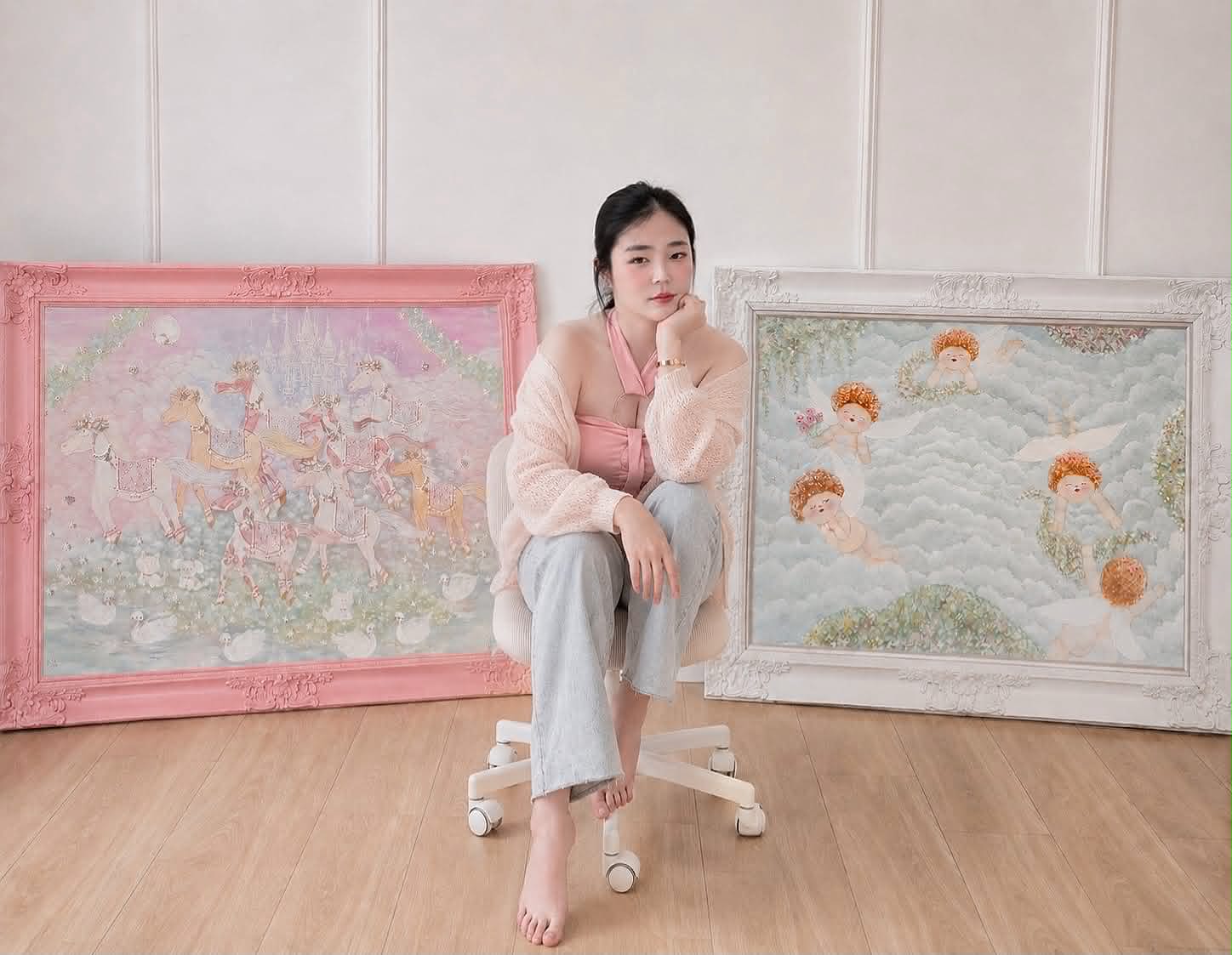 Yuki Pepper with her hand-painted artworks